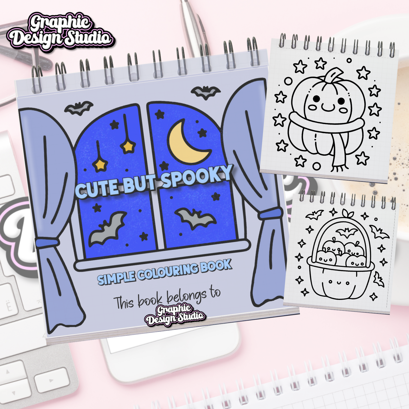 Coloring book titled 'Cute But Spooky' with Halloween-themed pages on a pink surface.